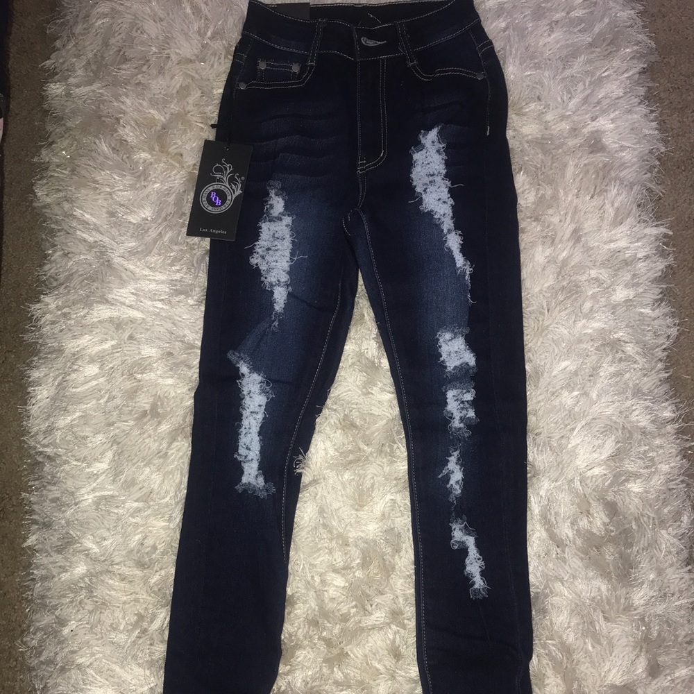 FashionNova distressed jeans